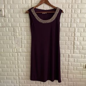 DB woman’s dress size 4 color purple Rm22
